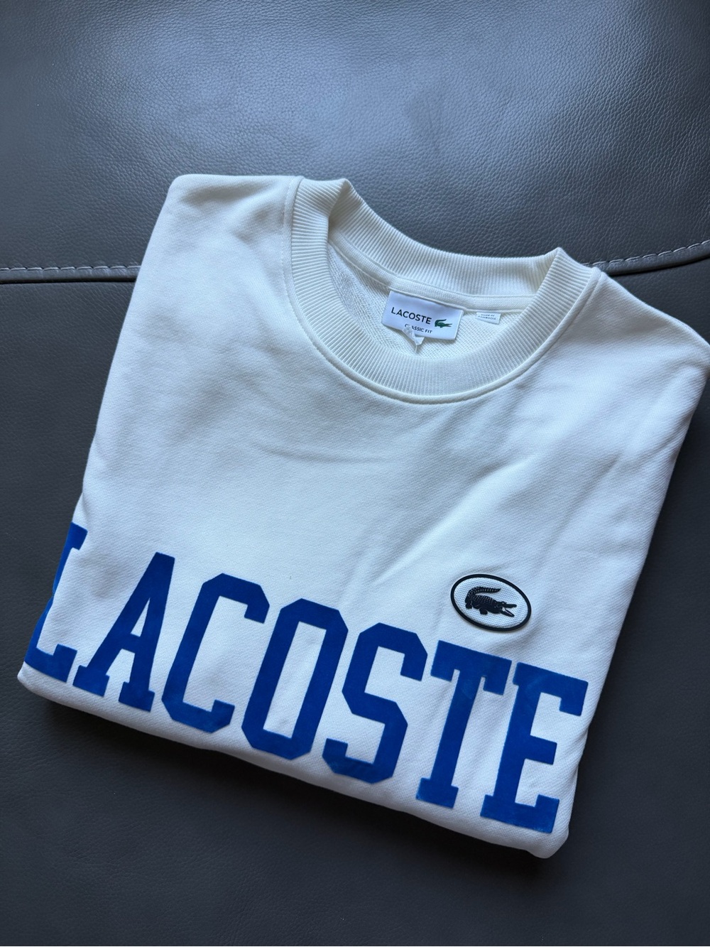 Lacoste White Crewneck Sweatshirt with Blue Collegiate Logo